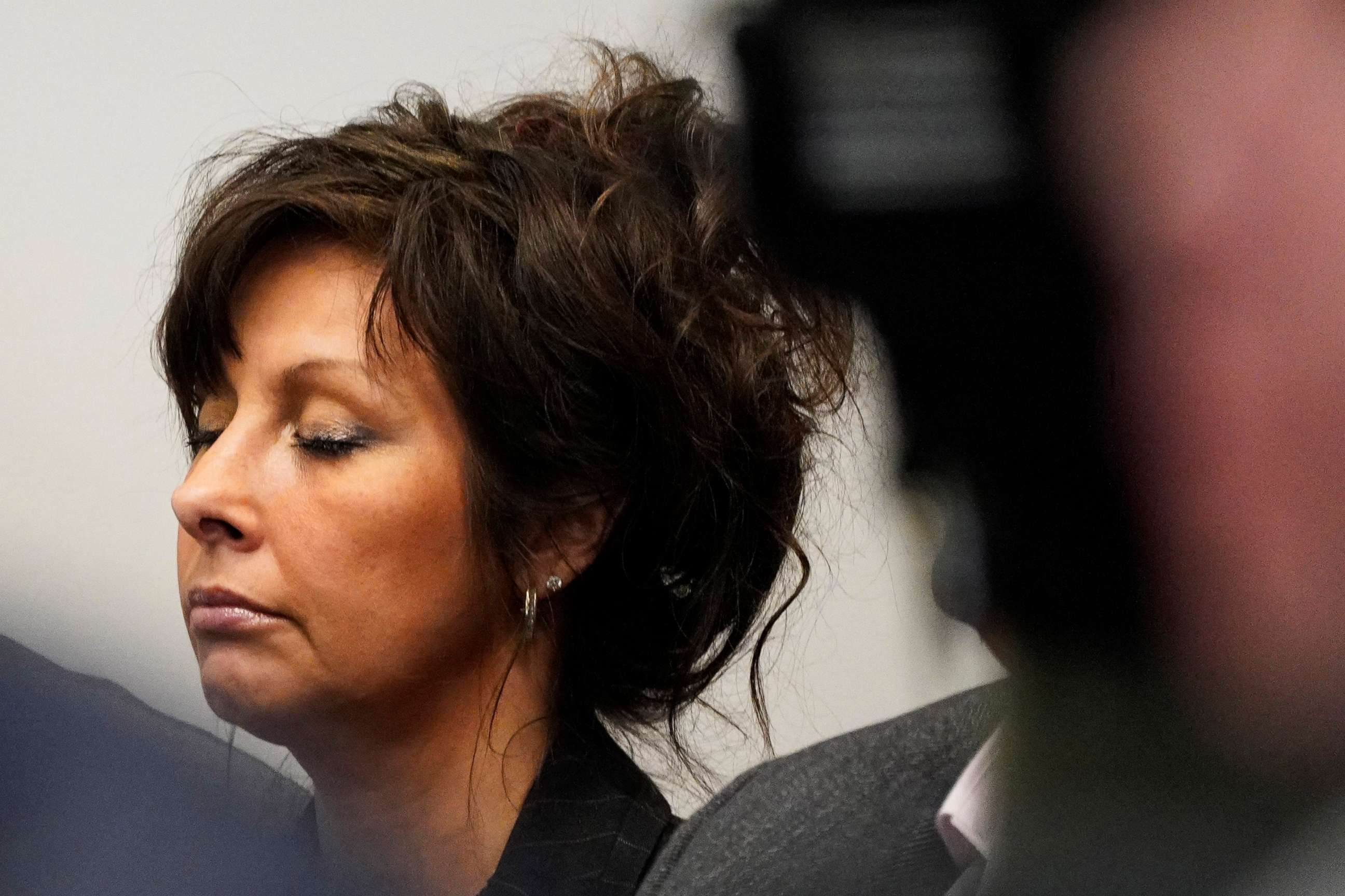 PHOTO: Denise Pesina, mother of Robert Crimo III, closes her eyes during a hearing for her son in Lake County court in Waukegan, Ill. Aug. 3, 2022.