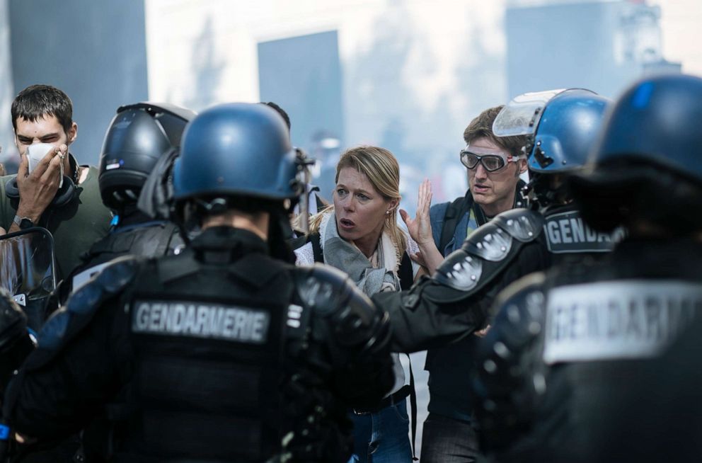 PHOTO: A woman gestures as she speaks with riot police officers during a yellow vests demonstration, in Paris, Saturday, Sept 21. 2019.