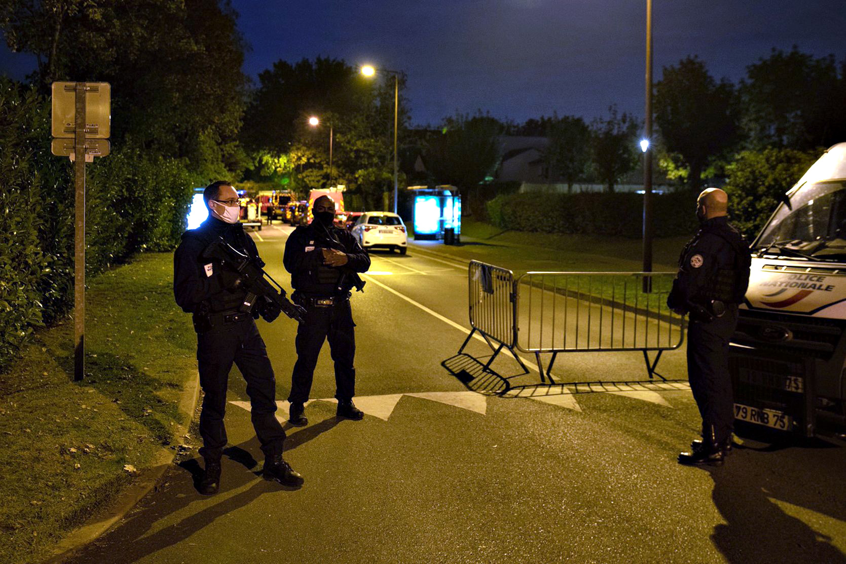 PHOTO: Police officers stand guard a street in Eragny on Oct. 16, 2020, where an attacker was shot dead by policemen after he decapitated a man in Conflans-Sainte-Honorine, France.