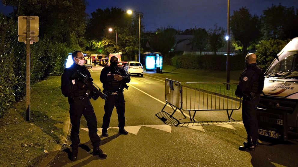 PHOTO: Police officers stand guard a street in Eragny on Oct. 16, 2020, where an attacker was shot dead by policemen after he decapitated a man in Conflans-Sainte-Honorine, France.