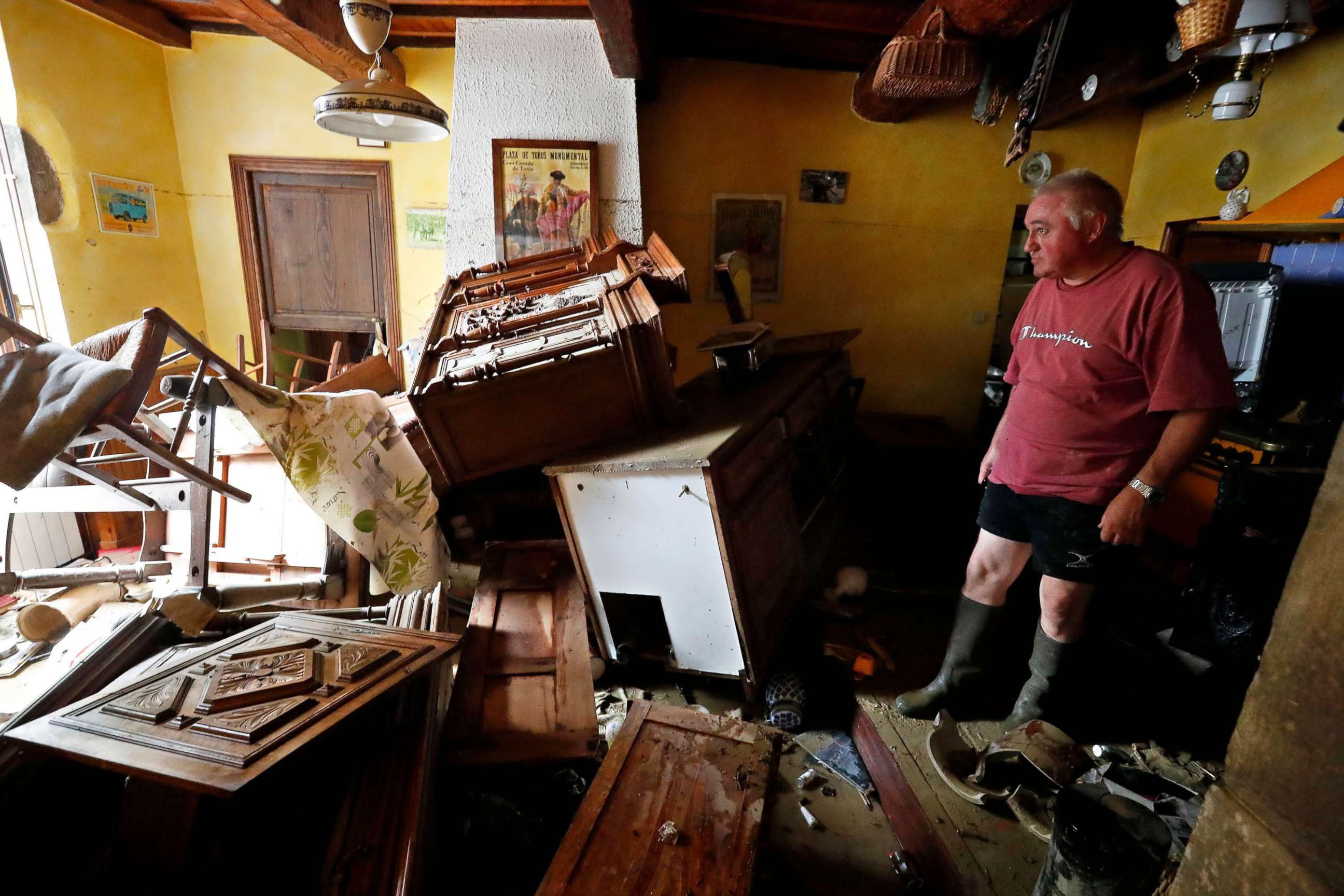 PHOTO: A man looks at a house that was damaged from heavy rain falls and violent storm that hit Aude department overnight in Villegailhenc, France, Oct. 2018.