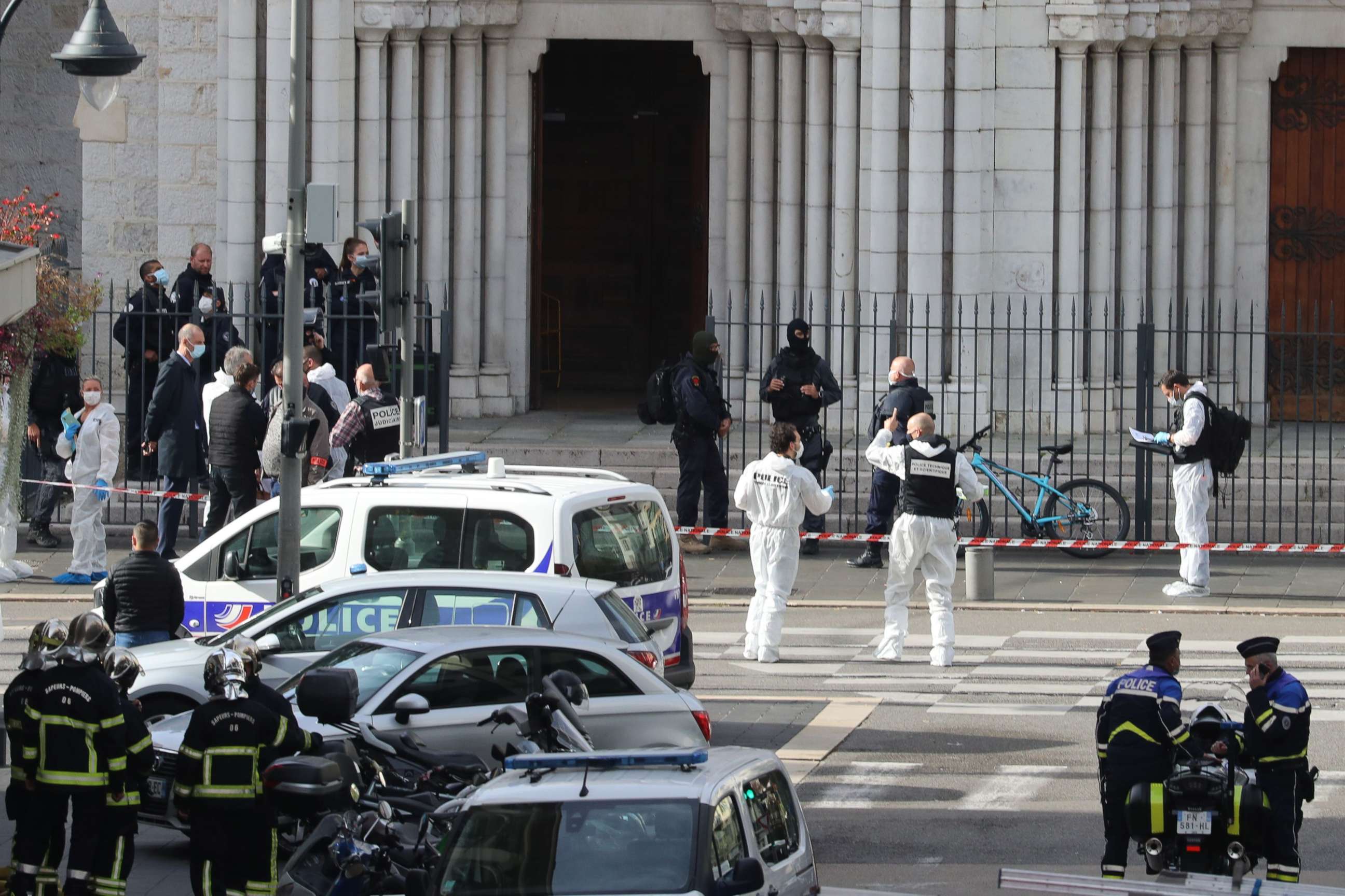 PHOTO: French forensics officers and firefighters arrive at the site of a knife attack in Nice on October 29, 2020. 