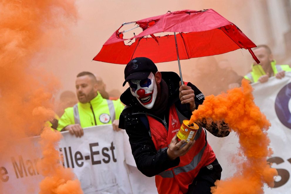 PHOTO: A man takes part in a demonstration to protest against the pension overhauls, in Marseille, France, Dec. 5, 2019.