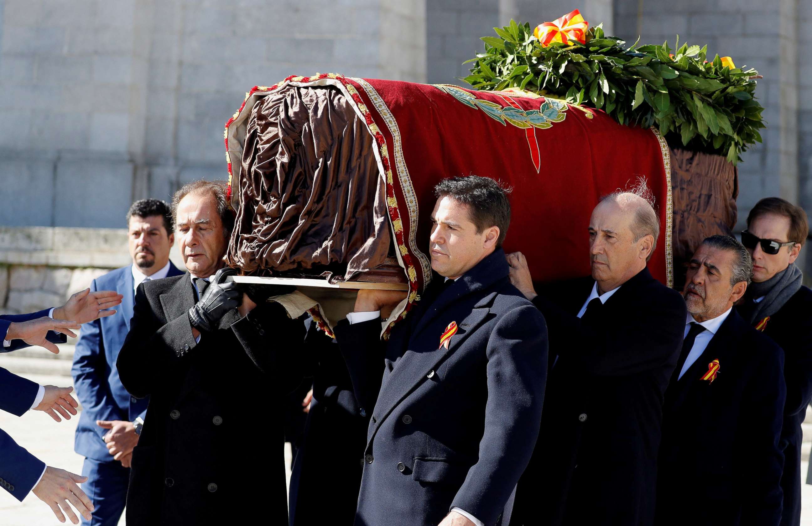 PHOTO: Late Spanish dictator Francisco Franco's relatives carry his coffin out of the Basilica of The Valle de los Caidos in San Lorenzo de El Escorial, Spain, Oct. 24, 2019.