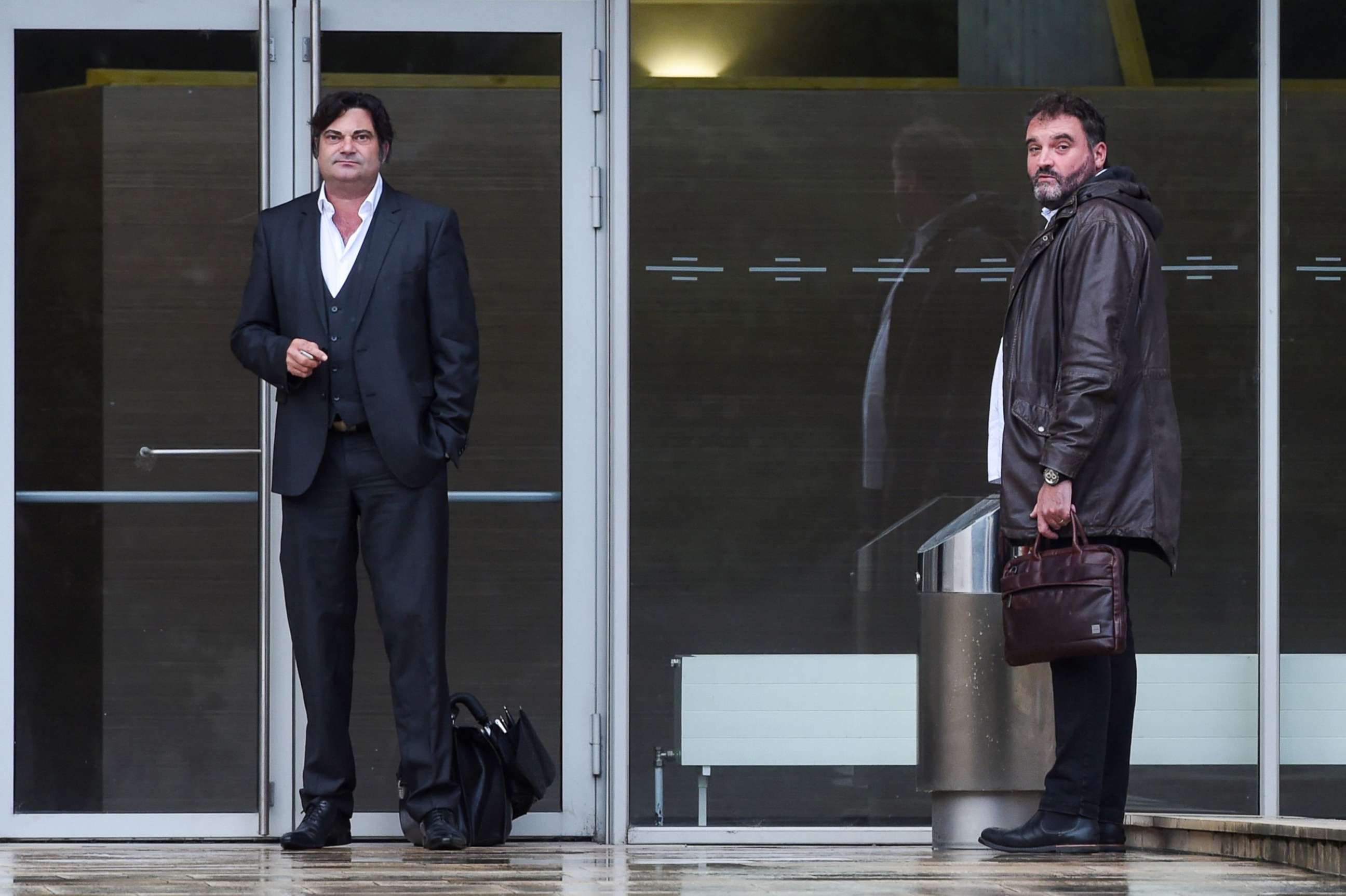 PHOTO: Frederic Pechier, right and his lawyer Randall Schwerdorffer, left, stand outside the Besancon courthouse in Paris on June 12, 2019.