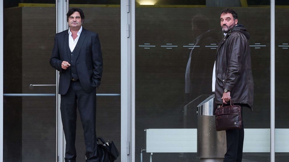 PHOTO: Frederic Pechier, right and his lawyer Randall Schwerdorffer, left, stand outside the Besancon courthouse in Paris on June 12, 2019.