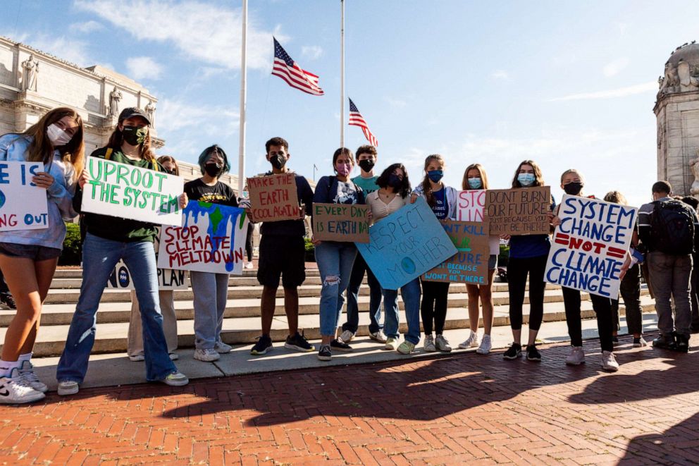 PHOTO: Demonstrators rally at Union Station before setting out on a March to the US Capitol during Fridays for Future climate strike in Washington, DC.