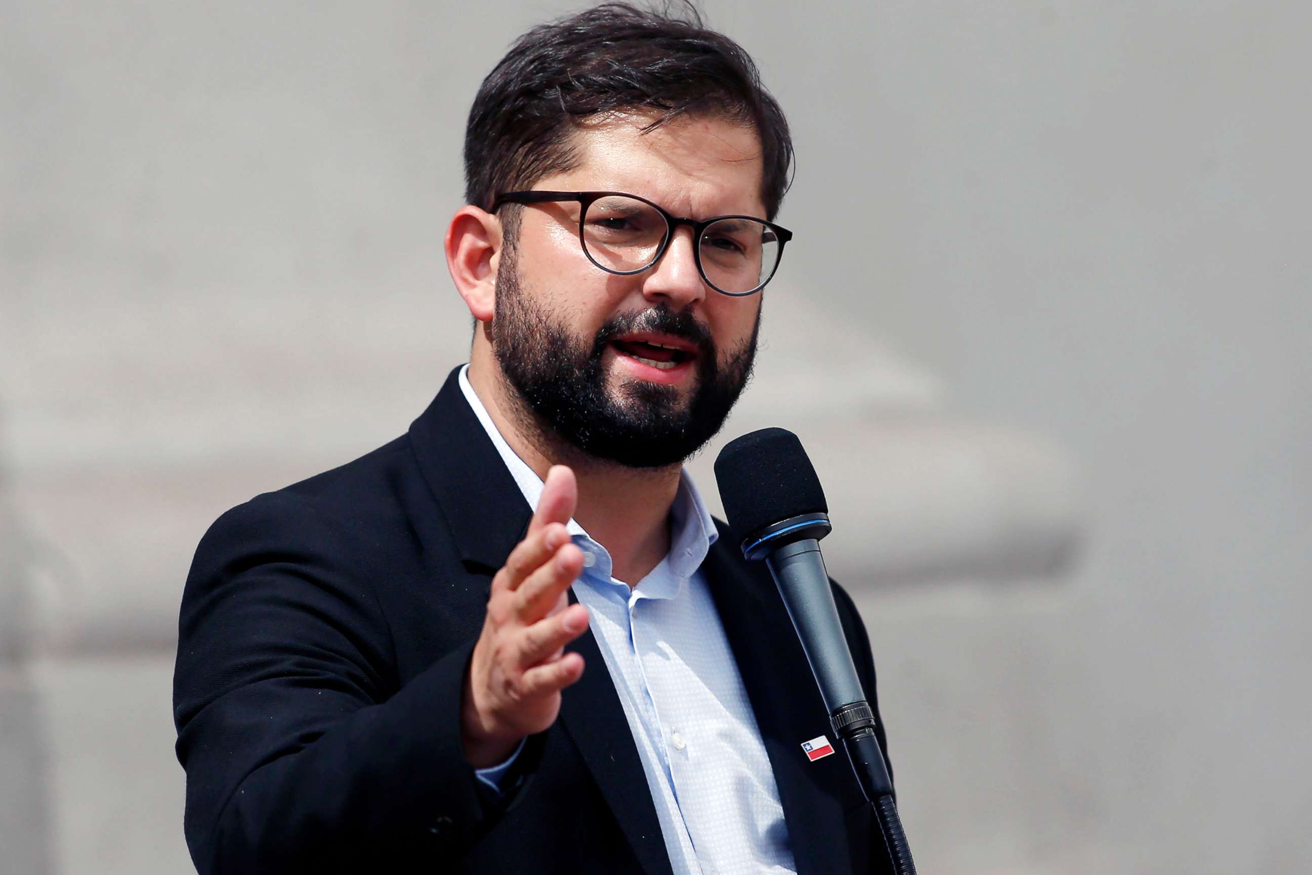 PHOTO: Newly elected President Gabriel Boric speaks with the media at La Moneda Presidential Palace, Dec. 20, 2021, in Santiago, Chile.