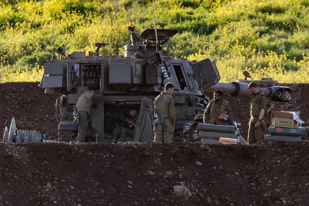 PHOTO: Israeli army soldiers attached to an artillery unit are deployed at a position in the upper Galilee, in northern Israel, near the Lebanon border on March 17, 2026.