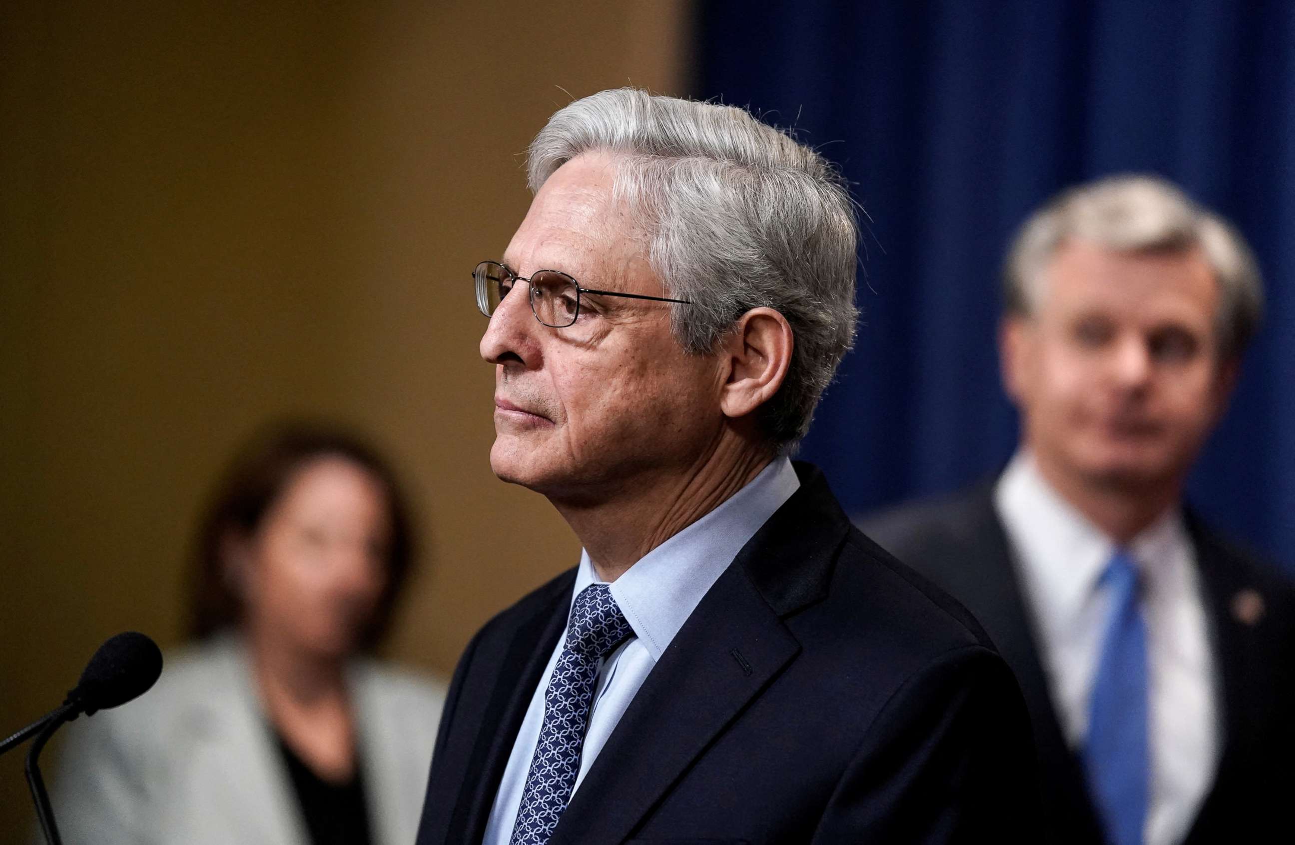 PHOTO: Attorney General Merrick Garland is flanked by Deputy Attorney General Lisa Monaco and FBI Director Christopher Wray, during a news conference at the Justice Department in Washington, D.C., April 6, 2022.