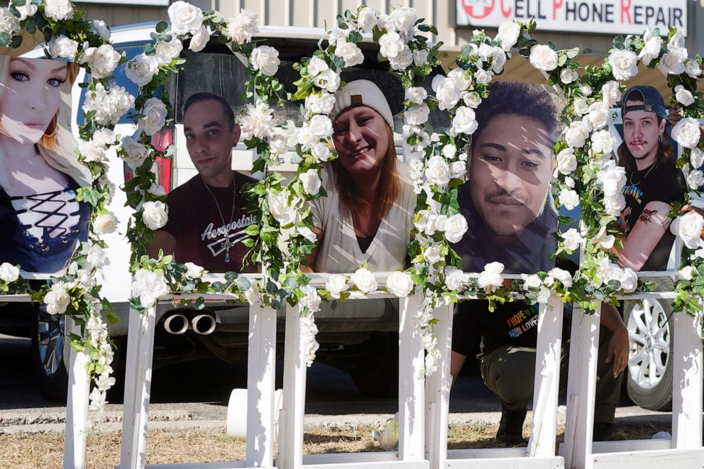 PHOTO: Photographs of victims of a weekend mass shooting at a nearby gay nightclub are on display at a memorial in Colorado Springs, Colo., Nov. 22, 2022.