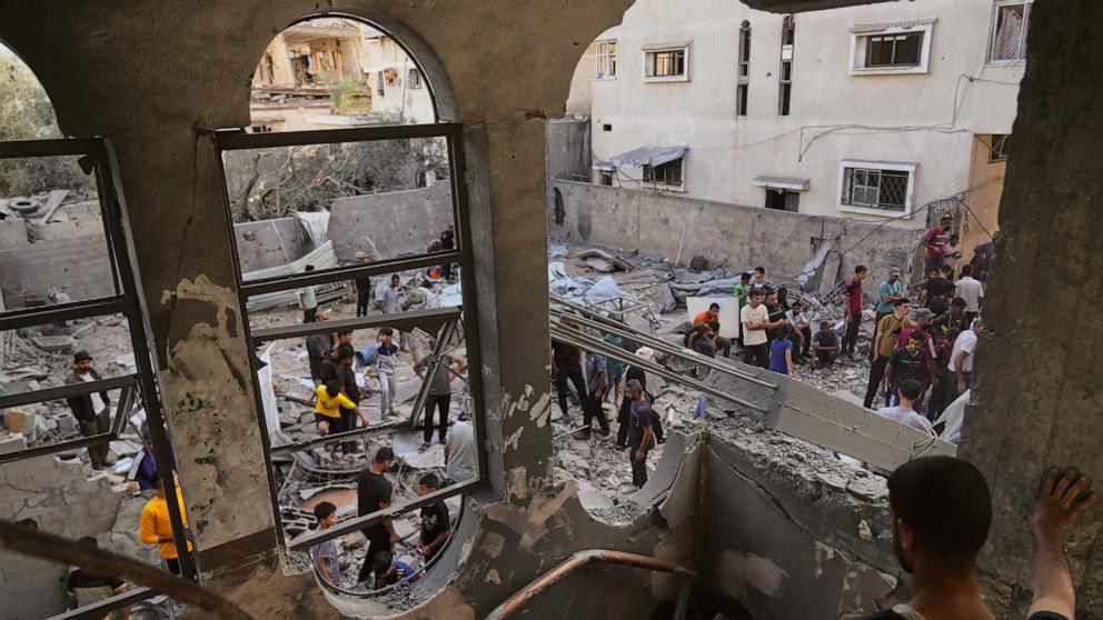 PHOTO: Palestinians survey the aftermath of an Israeli military strike on the Abu Dahrouj family home in Zawaida, central Gaza Strip, Sept. 25, 2025.