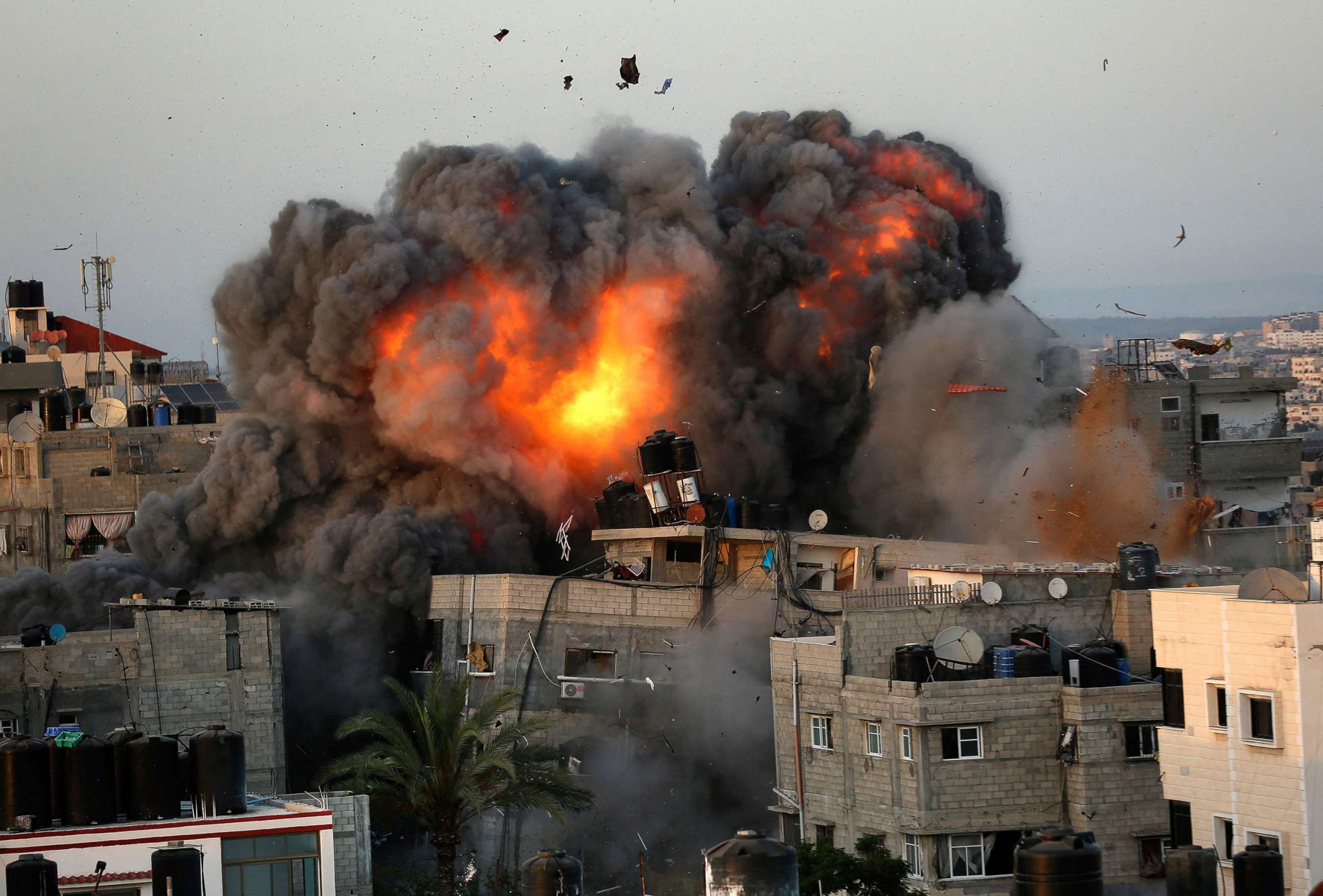 PHOTO: A ball of fire erupts from a building in Gaza City's Rimal residential district May 16, 2021.