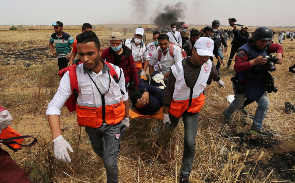 PHOTO: A wounded Palestinian protester is evacuated during clashes with Israeli security forces at the Israel-Gaza border where Palestinians demand the right to return to their homeland, April 20, 2018.