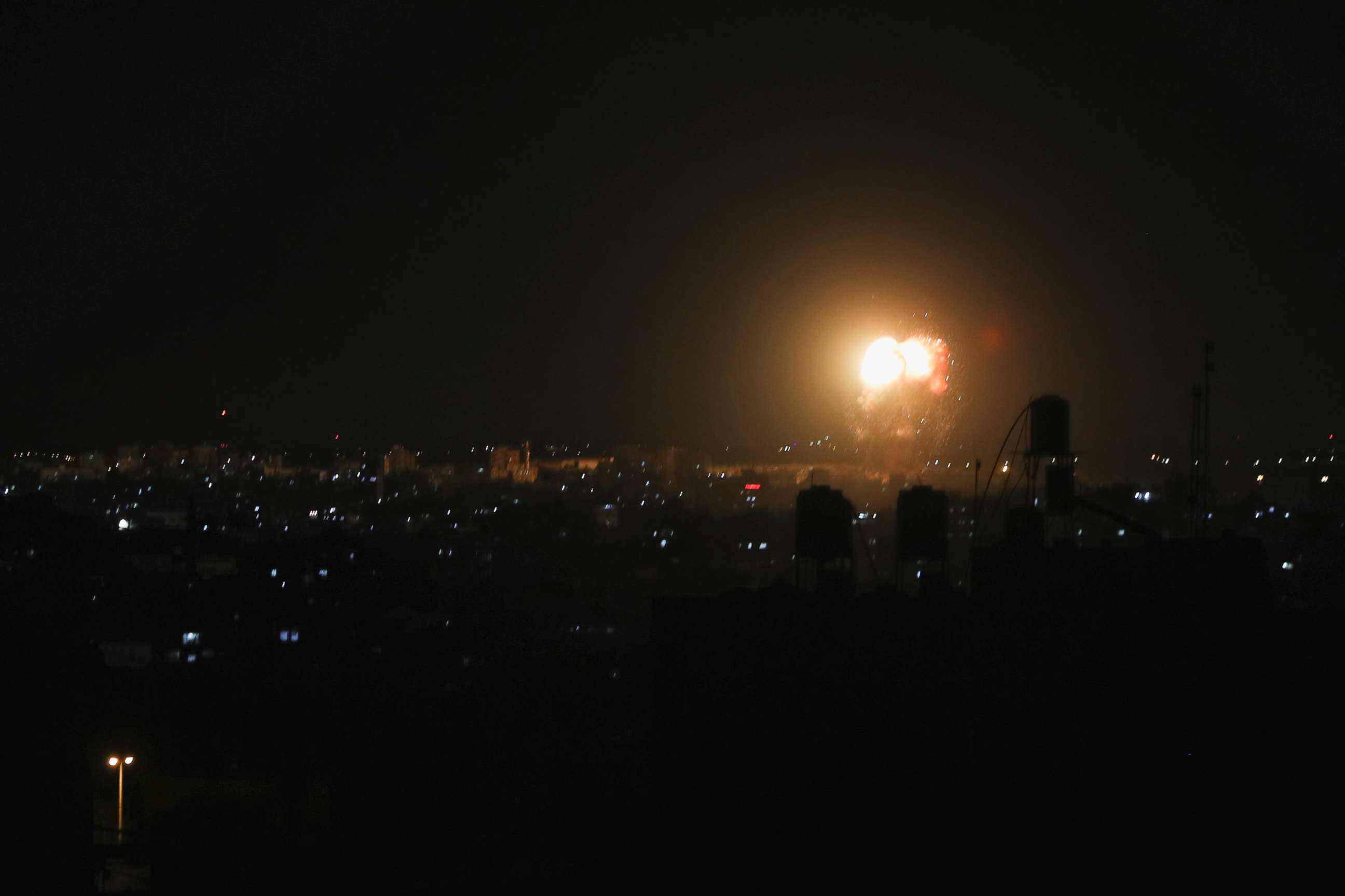 PHOTO: Smoke and flames are seen after an Israeli air strike in the northern Gaza Strip, June 17, 2021.