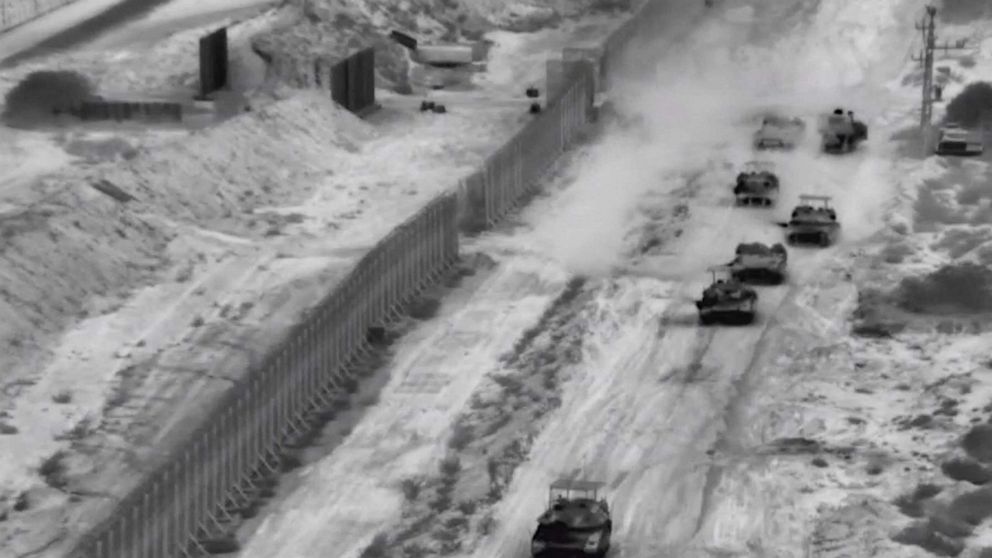 PHOTO: Israeli armoured vehicles take part in an operation, as the conflict between Israel and Hamas continues, at a location given as the northern Gaza Strip in this still image taken from handout video released Oct. 26, 2023.