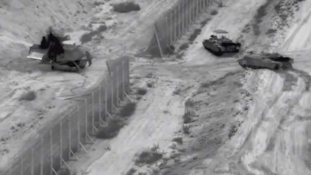 PHOTO: Israeli armoured vehicles take part in an operation, as the conflict between Israel and Hamas continues, at a location given as the northern Gaza Strip in this still image taken from handout video released Oct. 26, 2023.