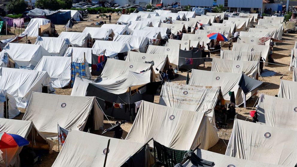 PHOTO: Palestinians, who fled their houses amid Israeli strikes, take shelter in a tent camp at a United Nations-run center in Khan Younis in the southern Gaza Strip, Oct. 19, 2023.