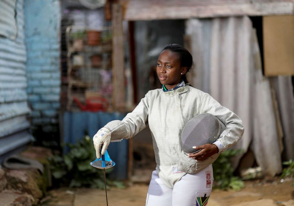 PHOTO: Nomvula Mbatha, 23, South Africa's number one women sabre fencer, poses for a photograph outside her home in Soweto, South Africa, March 14, 2020. 