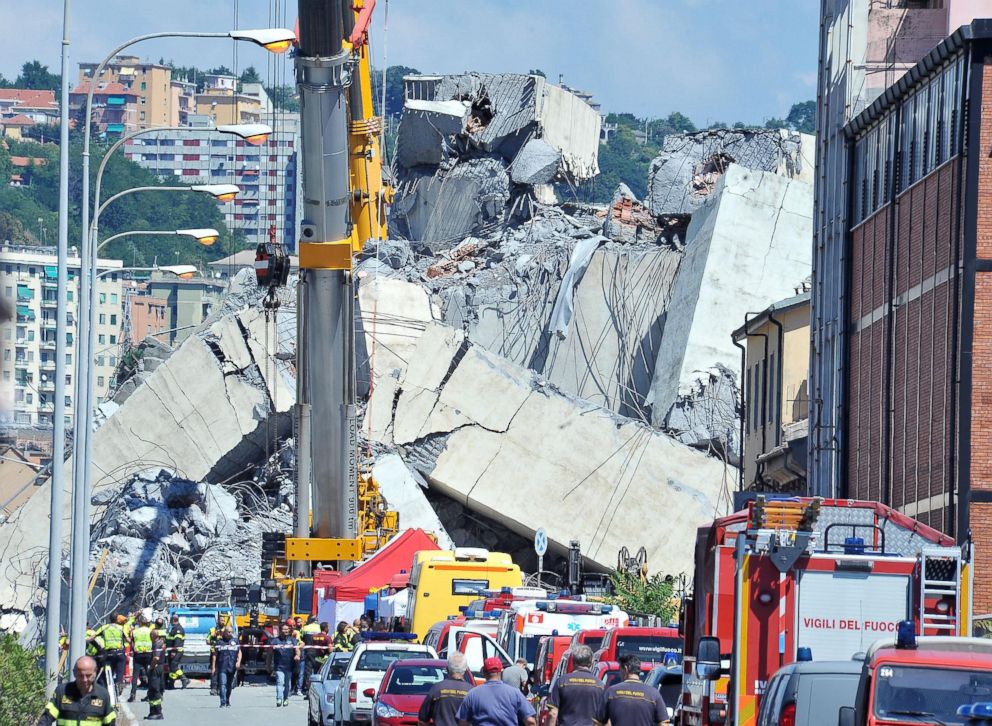 PHOTO: Rescue teams at work in the area of the collapsed Morandi bridge in Genoa, Italy,  Aug. 15, 2018.