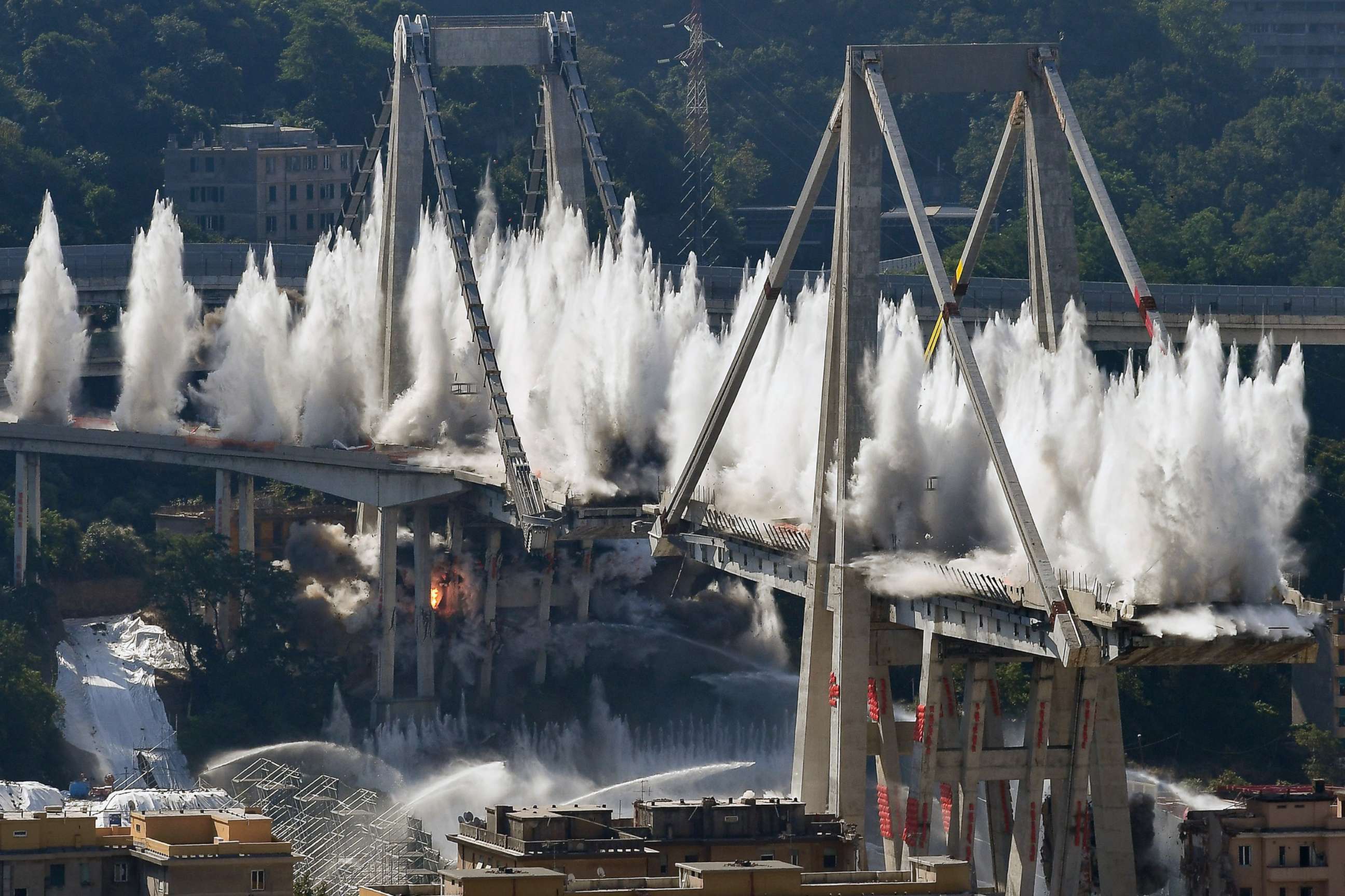 PHOTO:Explosive charges blow up the eastern pylons of Genoa's Morandi motorway bridge, June 28, 2019, in Genoa, Italy.