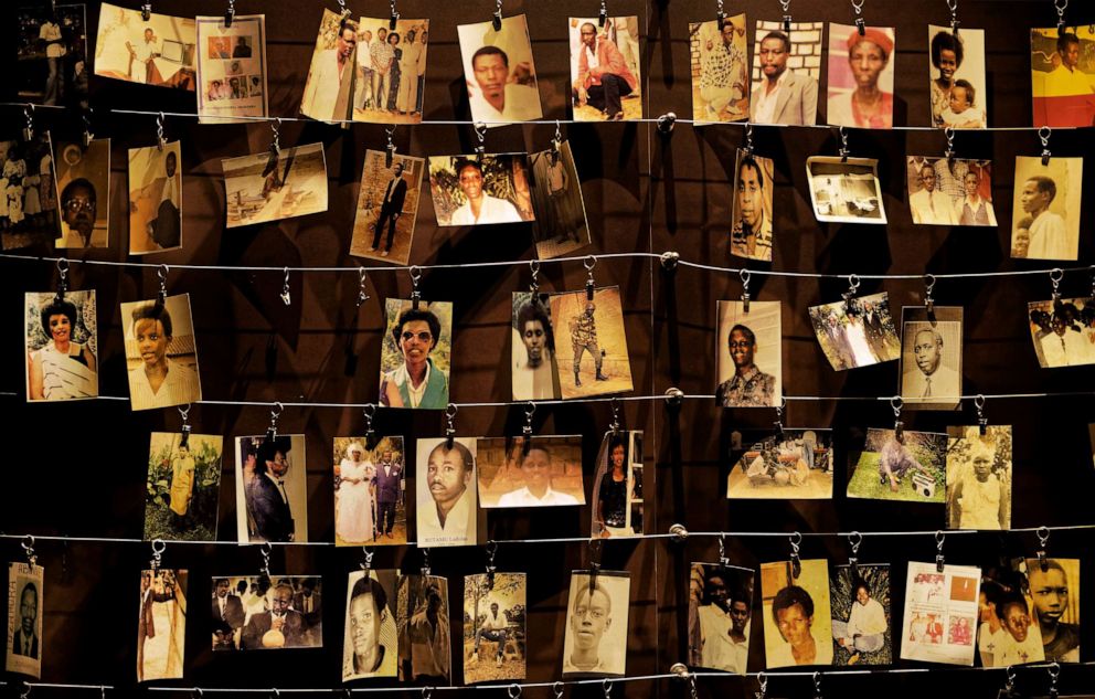 PHOTO: Family photographs of some of those who died hang on display in an exhibition at the Kigali Genocide Memorial centre in the capital Kigali, Rwanda on April 5, 2019.