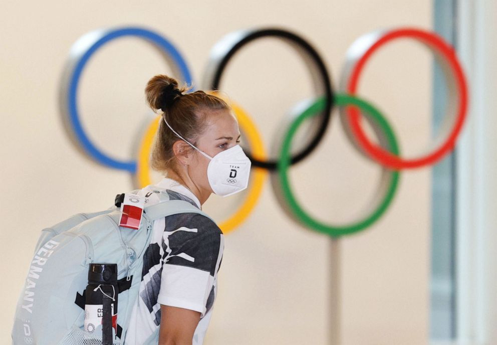 PHOTO: A member of Germany's Olympic rowing team arrives at Haneda international airport in Tokyo, Japan, on July 1, 2021, ahead of the Olympic Games.