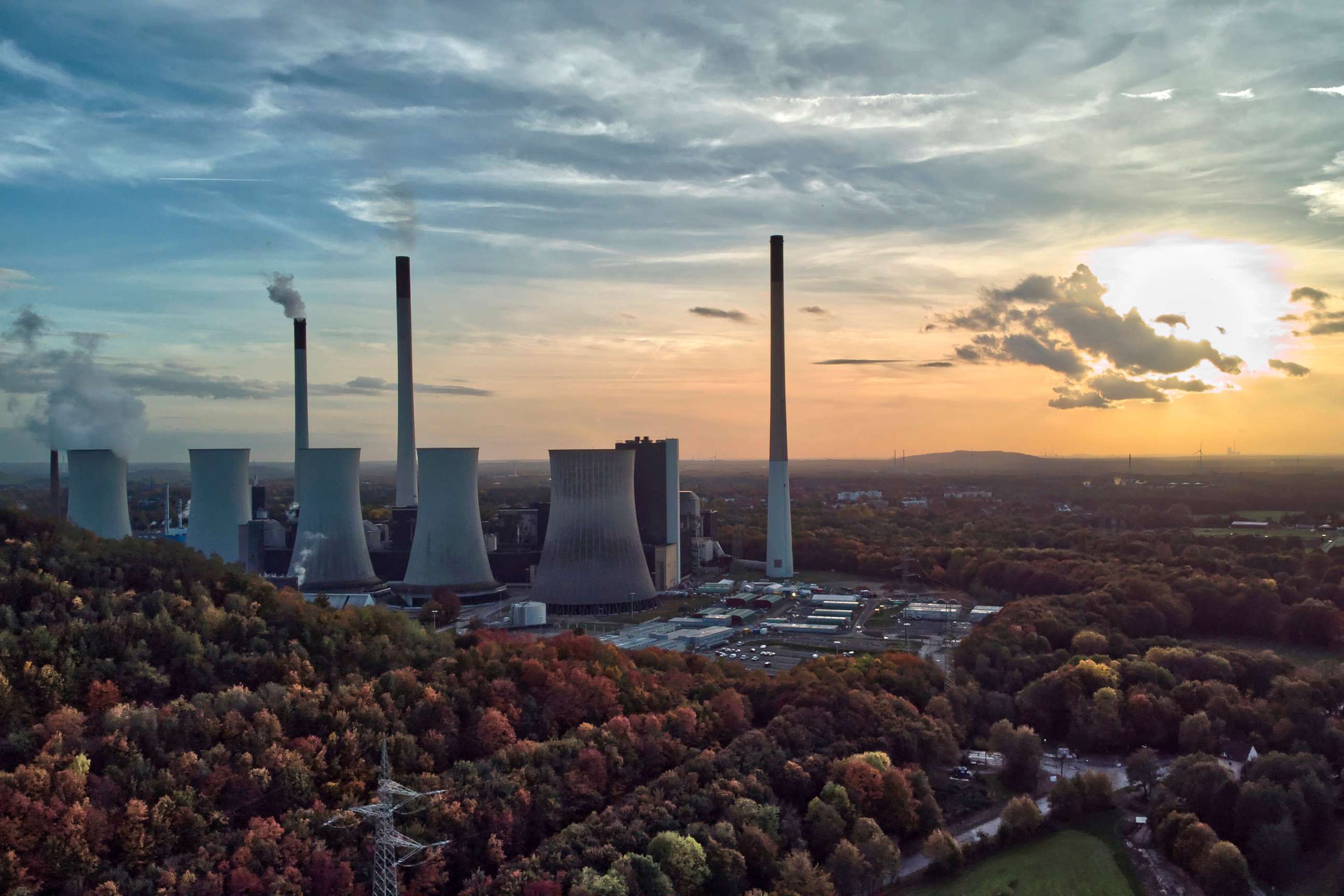 PHOTO: The sun sets behind the coal-fired power plant 'Scholven' of the Uniper energy company in Gelsenkirchen, Germany, on Oct. 22, 2022.
