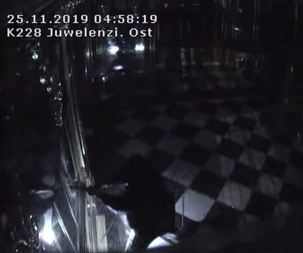 PHOTO: A still image taken from a security video shows thieves with torches and tools breaking into one of the display cabinets in Green Vault museum in Dresden, Germany, Nov. 25, 2019.