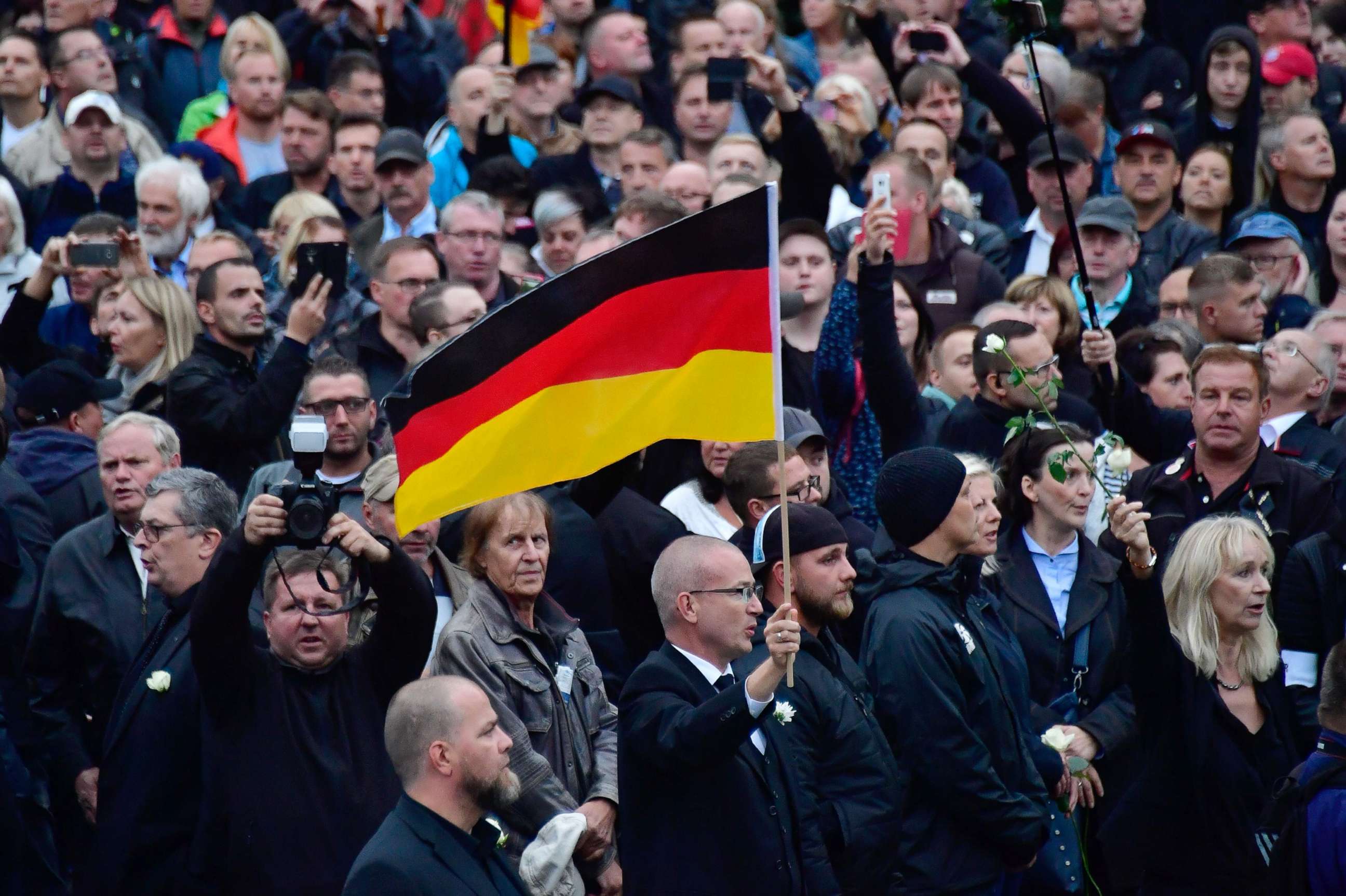 PHOTO: Demonstrators walk during a protest organised by the right-wing populist "Pro Chemnitz" movement, the far-right Alternative for Germany (AfD) party and the anti-Islam Pegida movement, on Sept. 1, 2018 in Chemnitz, Germany.