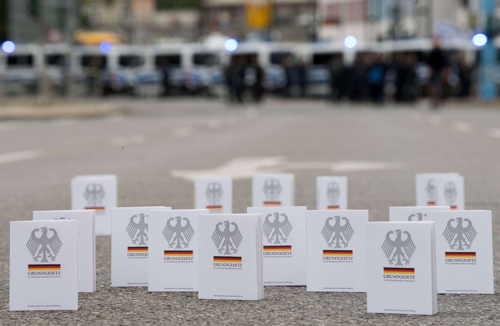 PHOTO: Numerous editions of the Federal Constitutional Law (Grundgesetz) are placed in the street by supporters of the alliance "Chemnitz Nazifrei" (Chemnitz without Nazis) near the location of a counter-march in Chemnitz, Germany, on Sept. 1, 2018.