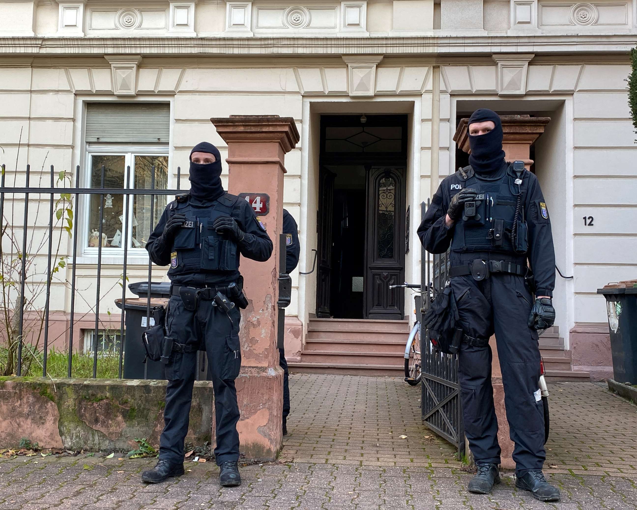 PHOTO: Police secures the area after 25 suspected members and supporters of a far-right terrorist group were detained during raids across Germany, in Frankfurt, Germany December 7, 2022. 