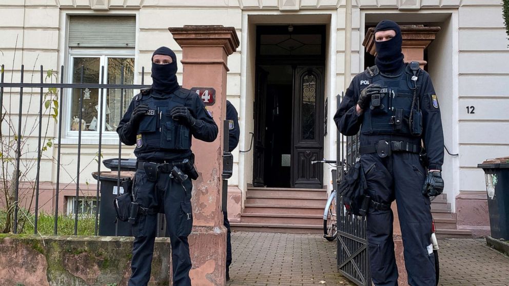 PHOTO: Police secures the area after 25 suspected members and supporters of a far-right terrorist group were detained during raids across Germany, in Frankfurt, Germany December 7, 2022. 