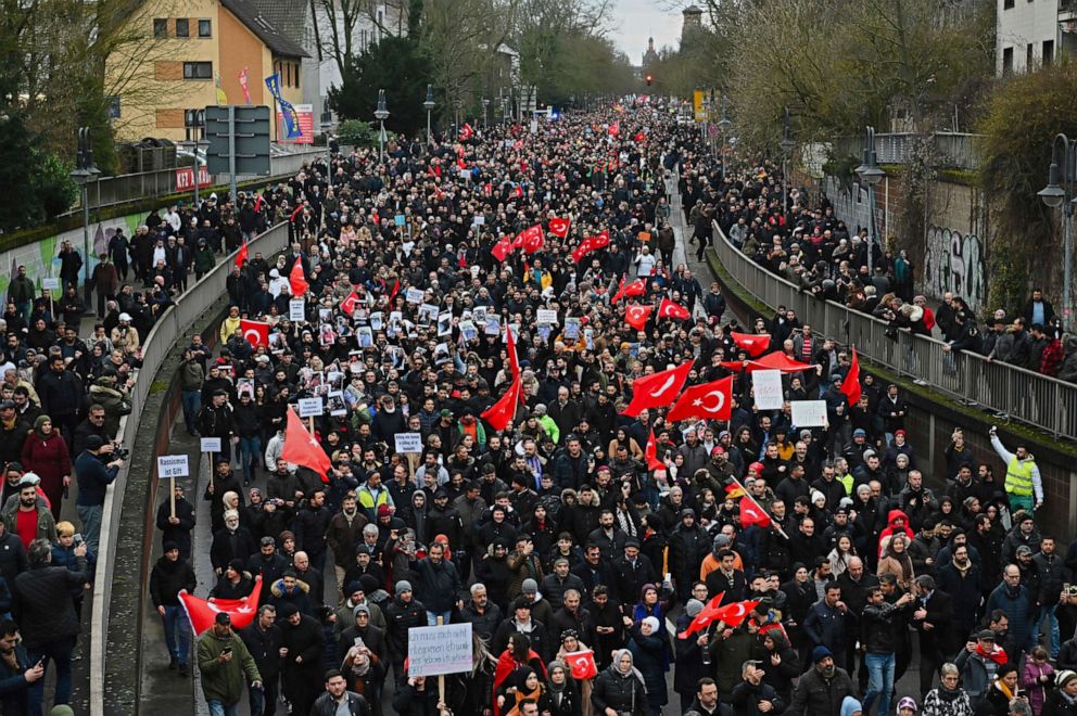 PHOTO: Thousands of people take part in a funeral march in Hanau, Germany, Feb. 23, 2020.