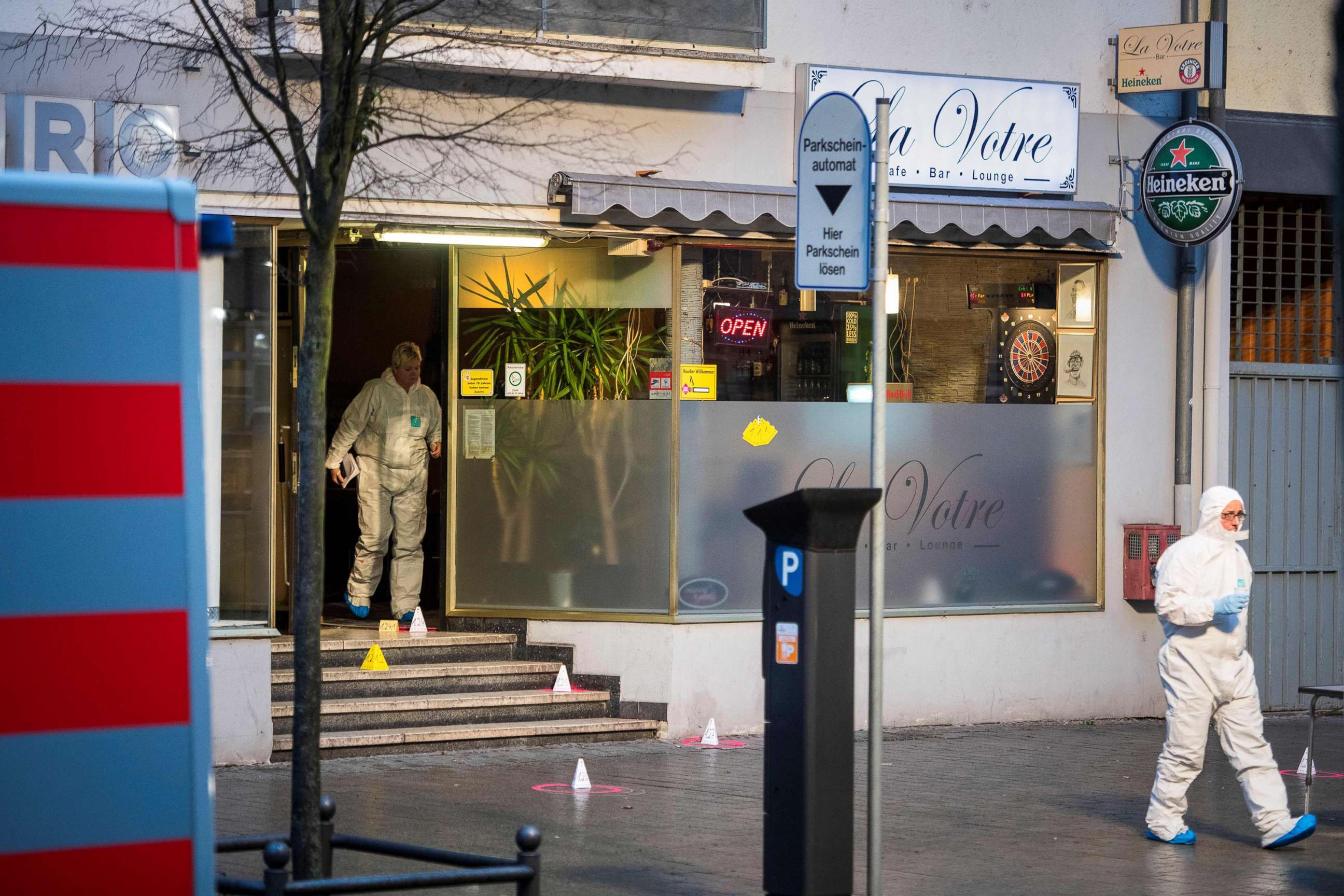 PHOTO: Forensic police  work at a crime scene in front of a bar in Hanau, Germany, Feb. 20, 2020, after eleven people were killed in two shootings the night before.