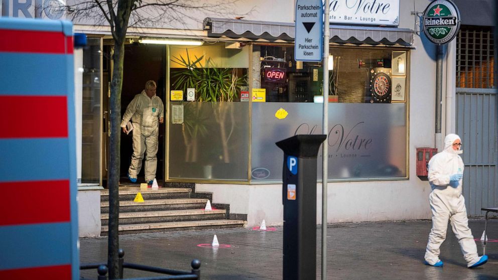 PHOTO: Forensic police  work at a crime scene in front of a bar in Hanau, Germany, Feb. 20, 2020, after eleven people were killed in two shootings the night before.