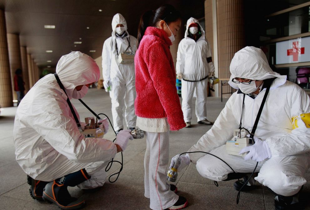 PHOTO: In this March 24, 2011 file photo, a young evacuee is screened at a shelter for leaked radiation from the tsunami-ravaged Fukushima Dai-ichi nuclear power plant in Fukushima, northeast of Tokyo.