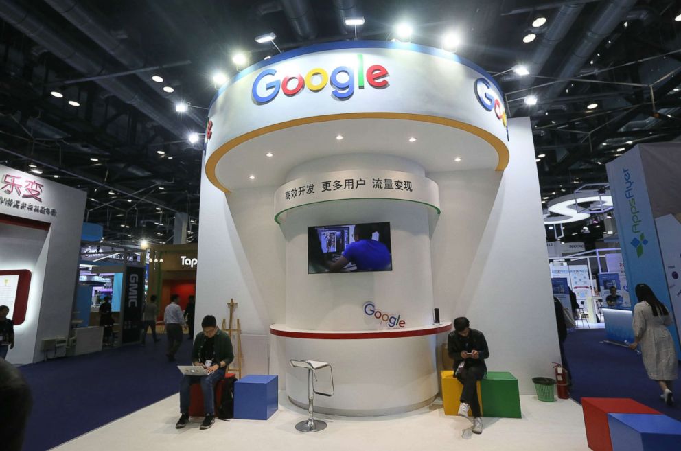 Visitors gather at the booth of Google during the Global Mobile Internet Conference (GMIC) 2017 at China National Convention Center on April 29, 2017 in Beijing, China.