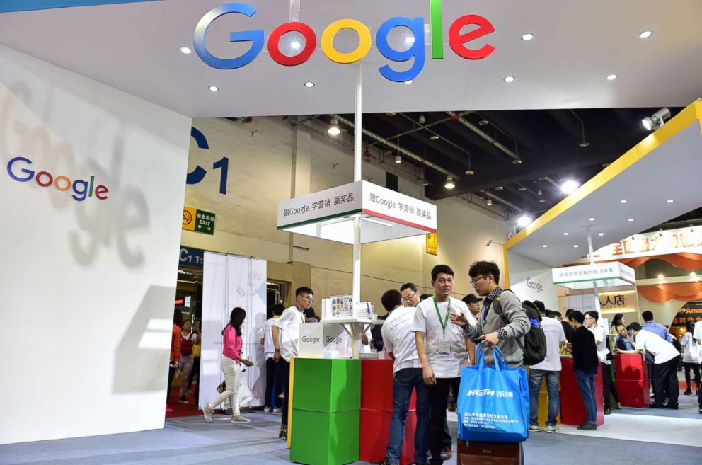 PHOTO: Visitors gather at Google booth during the 2016 China International Electronic Commerce Expo in Yiwu, China, April 11, 2016.
