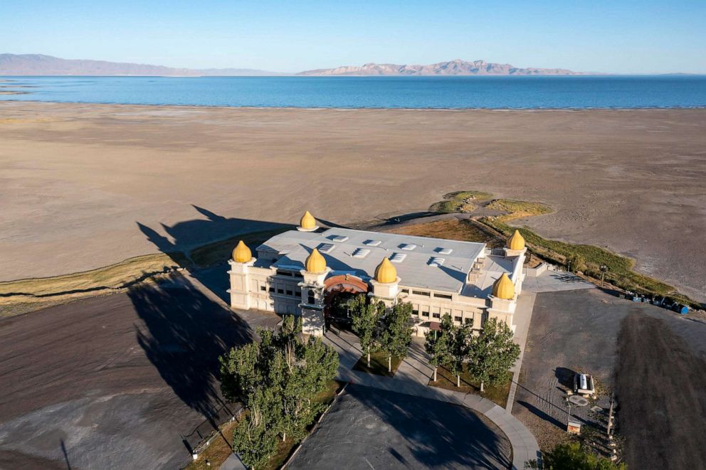 PHOTO: In this July 8, 2022, file photo, The Great Saltair, a concert venue that used to be on the shore of Great Salt Lake until the lake water level dropped dramatically, is shown in Magna, Utah.