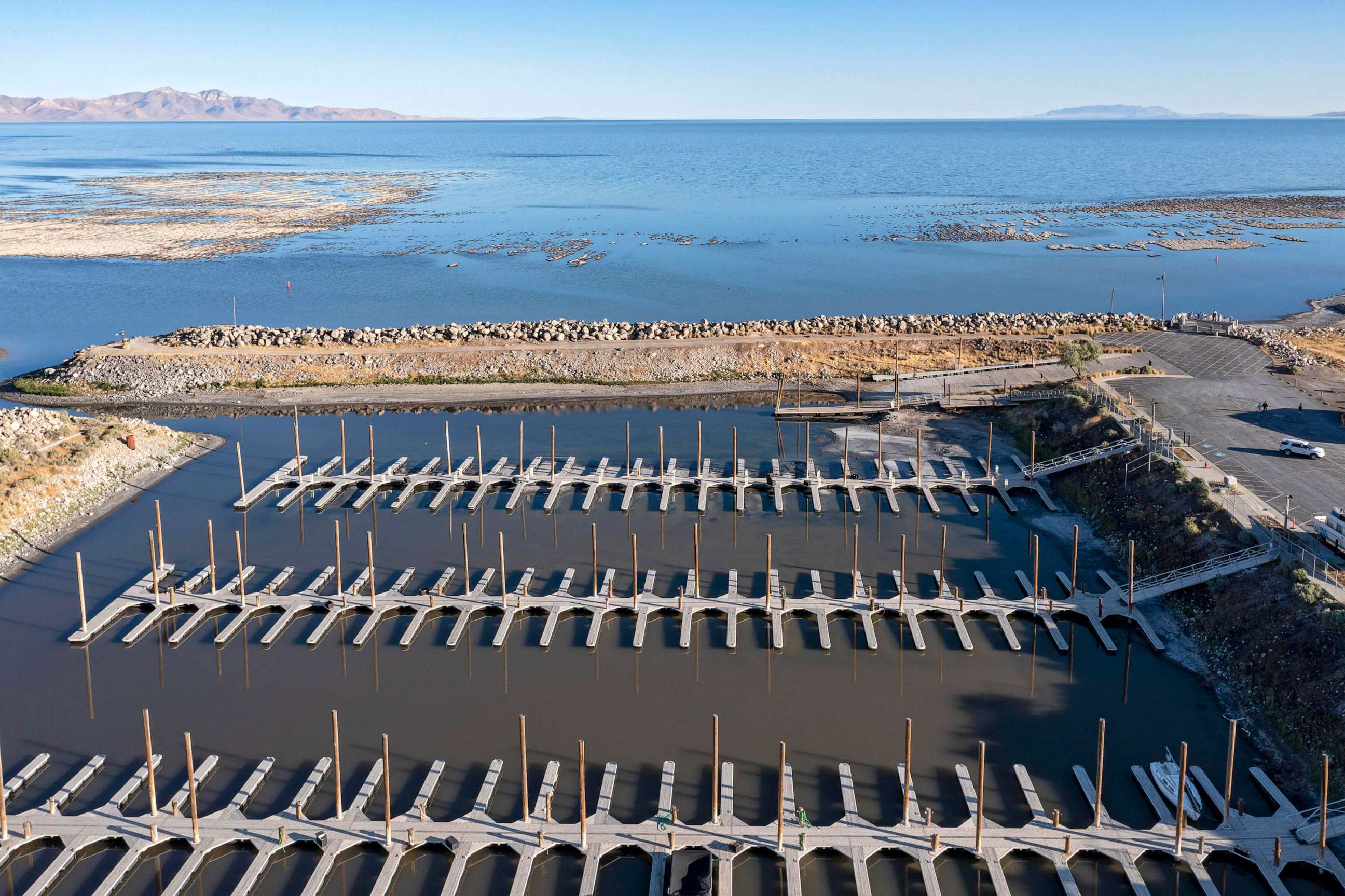 PHOTO: In this July 8, 2022, file photo, the marina, which cannot be used because the lake water level has fallen too low , is shown at Great Salt Lake Park in Magna, Utah.