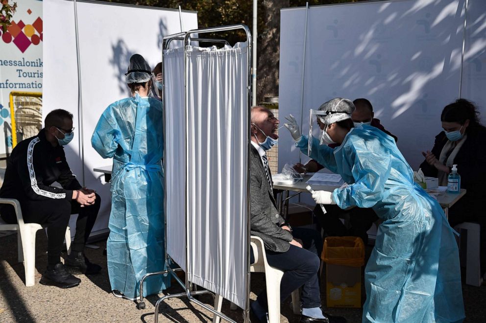 PHOTO: People are tested for COVID-19 by medical staff in the waterfront of Thessaloniki, Greece, on Oct. 29, 2020.