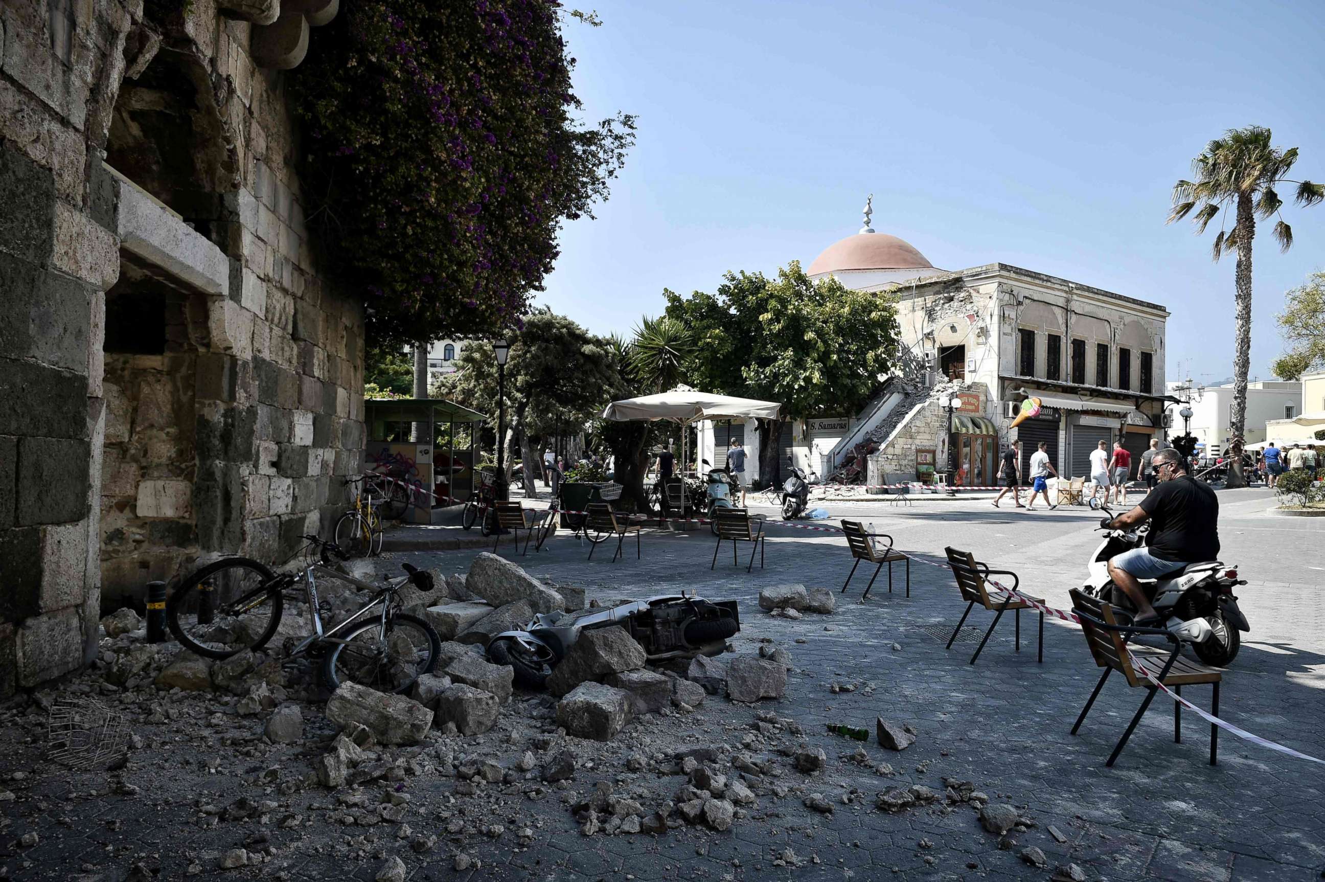 PHOTO: A man looks at rubble fallen from a quake damaged building on the Greek Island of Kos, July 21, 2017, following a 6.5 magnitude earthquake which struck the region.