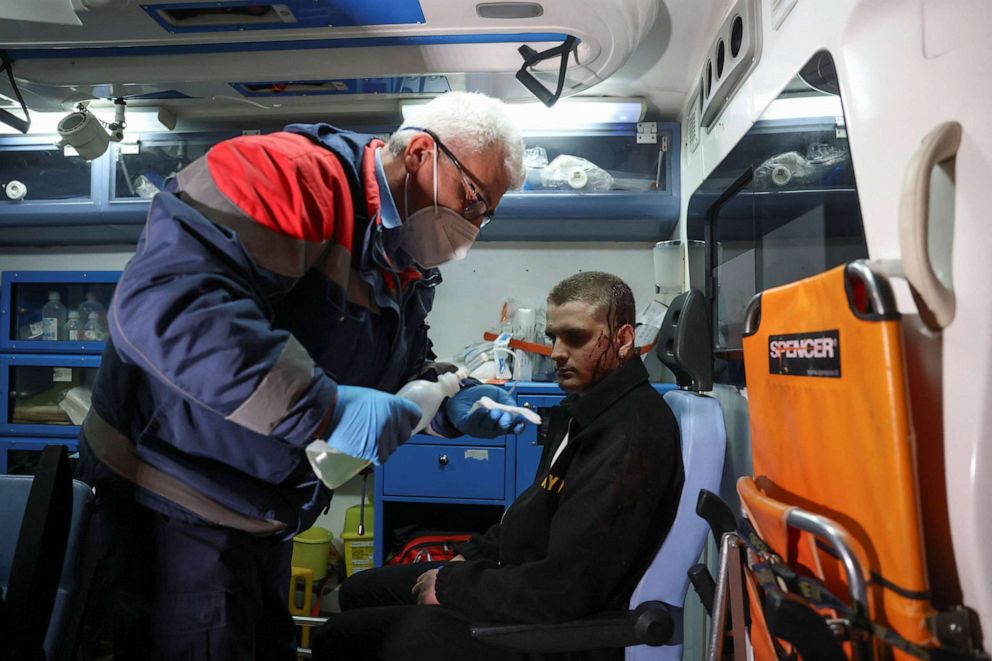 PHOTO: A medic treats an injured passenger, after two trains collided, near the city of Larissa, in Thessaloniki, Greece, March 1, 2023.