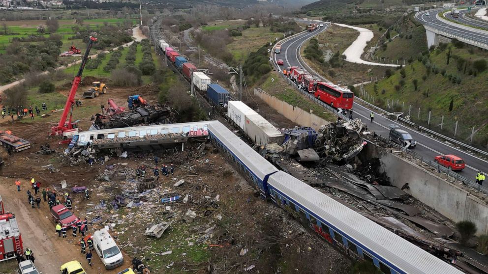 PHOTO: A crane, firefighters and rescuers operate after a collision in Tempe near Larissa city, Greece, March 1, 2023.