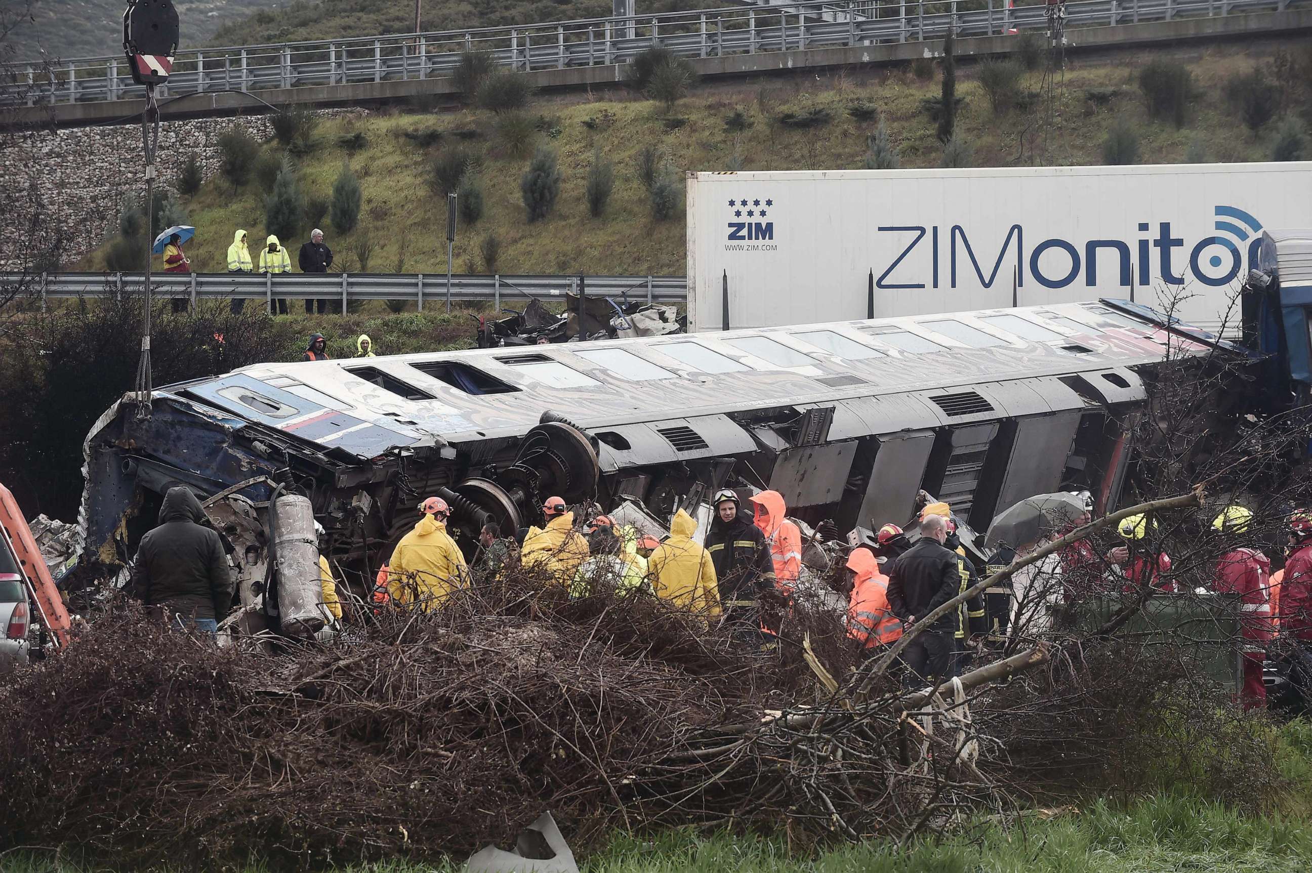 PHOTO: Police and emergency crews search through the debris of a crushed wagon for second day after a train accident in the Tempi Valley near Larissa, Greece, March 2, 2023.