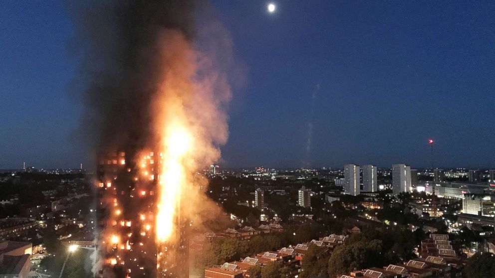 A huge fire engulfs the 24 story Grenfell Tower in Latimer Road, West London in the early hours of this morning in this June 14, 2017 file photo in London.