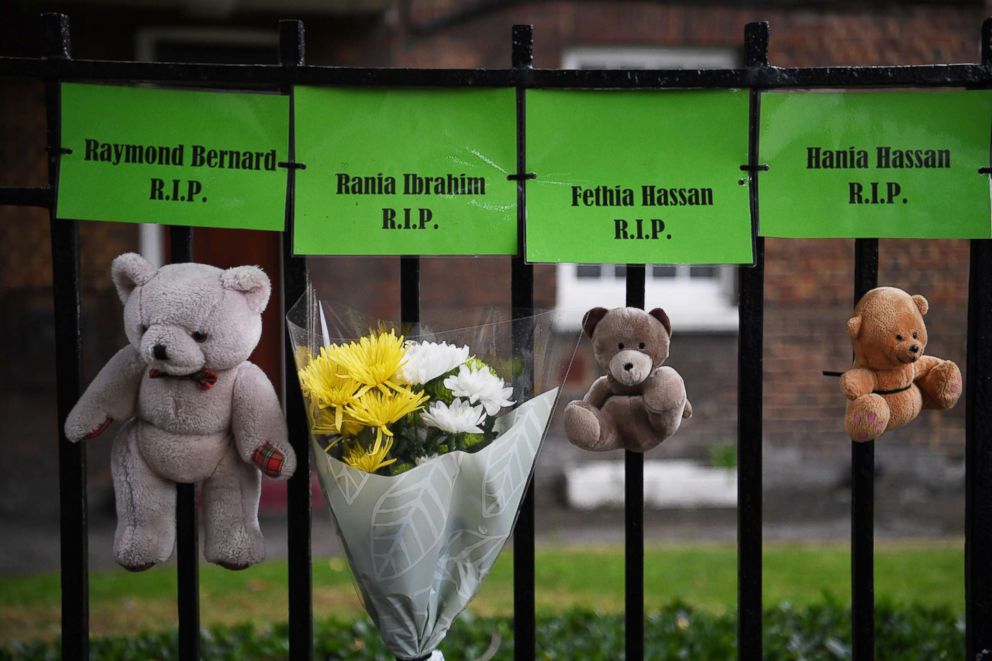 PHOTO: Tributes to victims of the Grenfell fire are displayed near the site of the tower bock in London, Britain, June 14, 2018, to mark the one year anniversary.