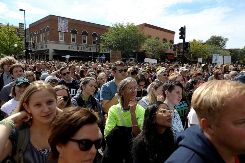 PHOTO: Attendees participate in a climate strike rally with climate change environmental teen activist Greta Thunberg, not pictured, in Iowa City, Iowa, Oct. 4, 2019.