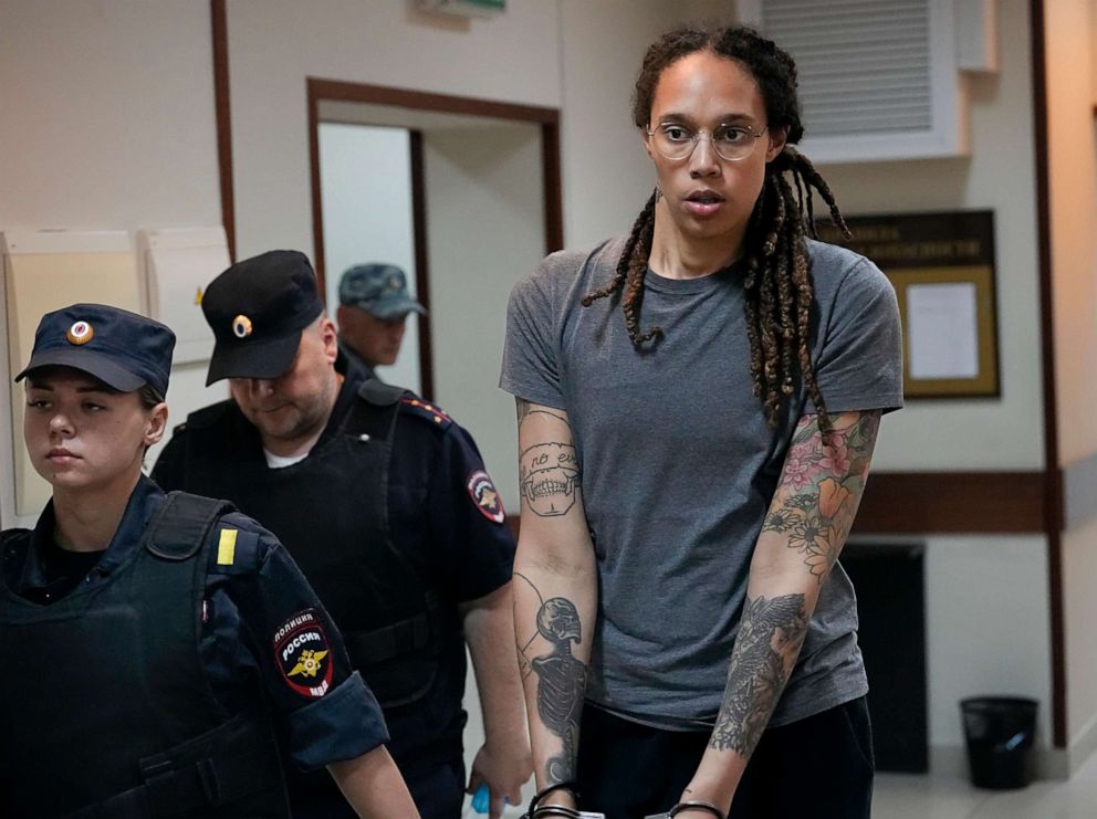 PHOTO: In this file photo, WNBA star Brittney Griner is escorted from a courtroom after a hearing in Khimki just outside Moscow, Russia, on Aug. 4, 2022.